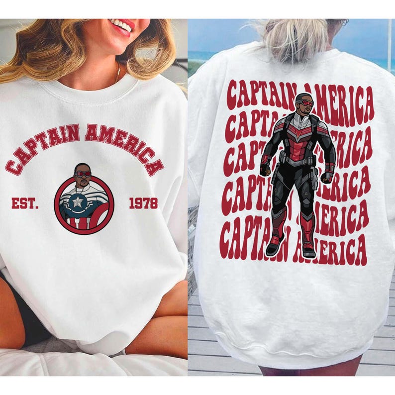 May include: White sweatshirt featuring the text "CAPTAIN AMERICA" in red arched lettering. The front design includes a circular graphic with a character illustration and the text "EST. 1978". The back of the sweatshirt repeats "CAPTAIN AMERICA" with a character illustration.