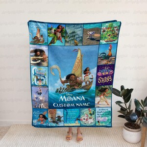 a woman standing in front of a large blanket