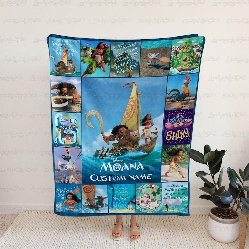 a woman standing in front of a large blanket