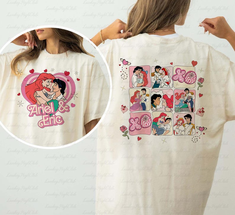 May include: Cream-colored t-shirt featuring a cartoon graphic of Ariel and Eric in a heart-shaped design. The back of the shirt displays a grid of illustrations with hearts and roses. The shirt is a casual wear item.