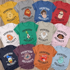 May include: A collection of colorful t-shirts featuring various cartoon characters. Each shirt displays the text "PRINCESS SECURITY" with the year "2025" or "2023". The shirts are in various colors, including yellow, gray, blue, red, white, green, tan, pink, navy, purple, orange, and light blue.