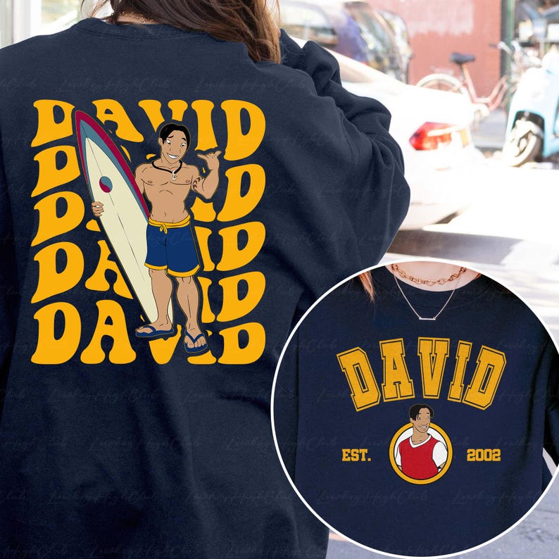 a person wearing a jacket with a picture of a man holding a surfboard