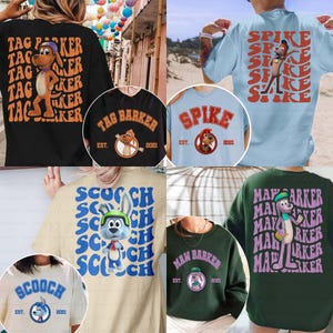 May include: Collection of graphic t-shirts featuring cartoon characters. Designs include "Tag Barker," "Spike," "Scooch," and "Ma Barker," each with unique illustrations and text. Shirts come in various colors, including black, blue, and green.