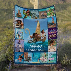 a blanket that has a picture of moan on it