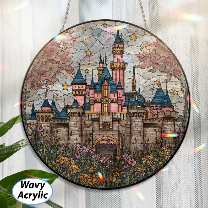 May include: Round stained glass art piece featuring a pink and blue castle with multiple turrets, surrounded by flowers and trees. The artwork is set against a sky with stars. The text "Wavy Acrylic" is visible.