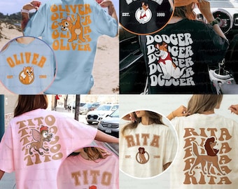 May include: Collection of oversized t-shirts featuring cartoon characters and text. Designs include "Oliver" with a cat graphic, "Dodger" with a dog, "Tito" with a mouse, and "Rita" with a lioness. Each shirt has a vintage aesthetic.