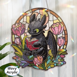 May include: A stained glass-style acrylic panel featuring a black dragon reading a red book, surrounded by pink and purple tulips. The panel has a circular shape with a decorative border and the text "Wavy Acrylic".