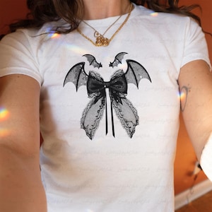Bat Wing Dark Coquette Baby Tee, Halloween Black Bat Baby Tee, Gothic Aesthetic Girl Outfit, Vintage Halloween Bow Feminist Baby Tee, MYJ011