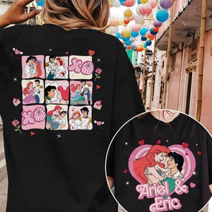 May include: Black t-shirt featuring a collage of cartoon images of a couple in love, with hearts and roses. A circular graphic on the lower right shows the couple embracing, with the text "Ariel & Eric".