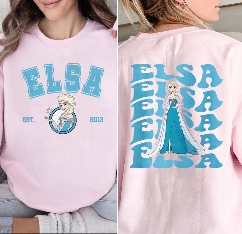 a woman wearing a pink shirt with a frozen princess on it