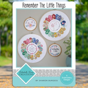 Pode incluir: Seis desenhos de bordado com coroas florais com citações inspiradoras, incluindo "Os pequenos momentos contam", "Esta é uma forma de nos lembrar do que realmente importa", "Faça um pedido" e "Na verdade, posso."