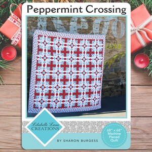 May include: A quilt pattern called "Peppermint Crossing" by Lilabelle Lane Creations, designed by Sharon Burgess. The quilt is 68 inches by 68 inches and is machine pieced. The quilt is red, white, and blue with a geometric pattern.