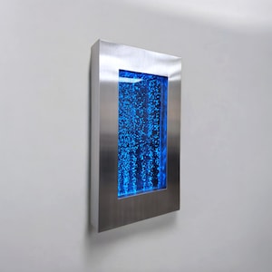 May include: A stainless steel framed bubble wall with a blue LED light illuminating the bubbles.