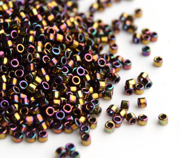 HTL462 10 Grams Miyuki Tila Half Cut Beads-Gold Opaque Iris Metallic