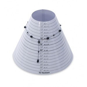 May include: A white, cone-shaped EZ Necklace sizer with black markings and measurements in inches and centimeters. A black beaded necklace is draped over the sizer. The measurements range from 11 inches (28 cm) to 27 inches (68.5 cm).
