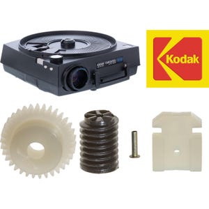 May include: A black Kodak Carousel 760H projector with a red and yellow Kodak logo, accompanied by a white plastic gear, a black cylindrical ribbed component, a small metal pin, and a white plastic bracket piece on a plain white background.