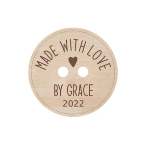 May include: A round wooden button with the text "MADE WITH LOVE BY GRACE 2022" and a small heart in the center.