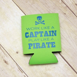 May include: Green foam can cooler with a blue skull and crossbones graphic and the text "Work like a Captain Play like a Pirate".