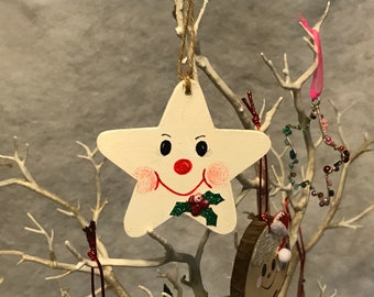 A cute, hand painted, wooden,hanging star, star ornament