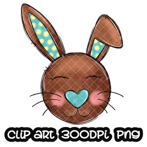 May include: A cartoon bunny rabbit with brown fur, blue eyes, and a blue heart-shaped nose. The bunny has yellow and blue polka dot ears.