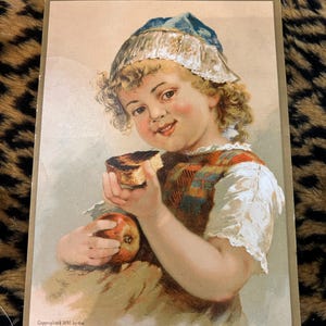 Prof. Horsford's bakpoederadvertentiekaart 1885 Victoriaans kind eet cake met een appel