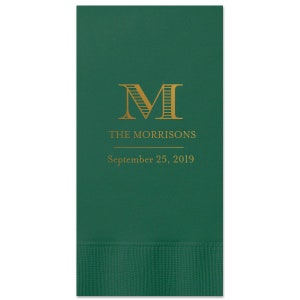 Pode incluir: Guardanapo de papel verde com um monograma dourado "M" e o texto "THE MORRISONS" e "September 25, 2019".