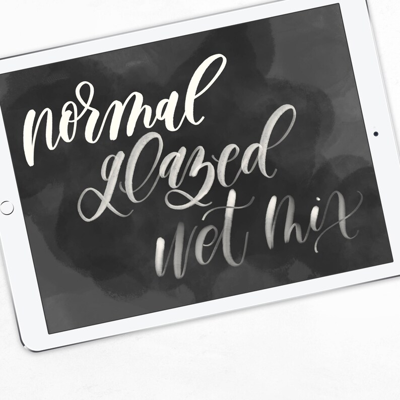 May include: A white chalk board with the words "normal glazed wet mix" written in white chalk.