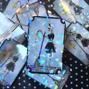 Sticker holographique blanc Les Sims La carte de tarot La vie et la mort L'Ermite Bonehilda