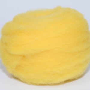 May include: A ball of bright yellow wool roving, suitable for fibre art projects. The wool is soft and fluffy, with a slightly textured appearance. The colour is a vibrant, sunny yellow.