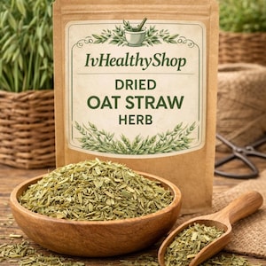 May include: A brown paper pouch labelled IvHealthyShop Dried Oat Straw Herb, featuring a mortar and pestle illustration. A wooden bowl filled with dried green oat straw sits in front, accompanied by a small wooden scoop containing the same herb.
