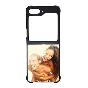 May include: Black phone case with a photo of a couple smiling and laughing. The woman is wearing a pink bikini top and the man is wearing a white shirt. The photo is set against a blurred background of a beach.