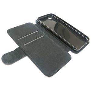 May include: Black leather phone case with a flap that folds over the screen. The case has two card slots and a magnetic closure.