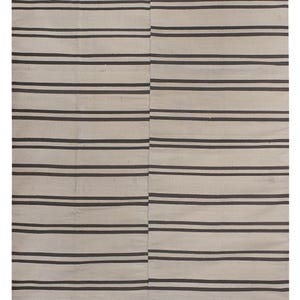 May include: A white and brown striped rug with a simple design. The rug is made of natural fibers and has a rustic look.