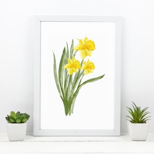 Puede incluir: Una pintura de acuarela de un ramo de narcisos amarillos con tallos y hojas verdes.