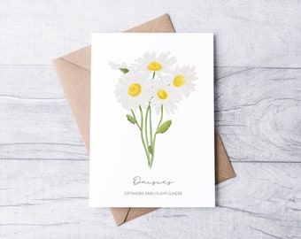 Biglietto con margherite ad acquerello, fiore di nascita di aprile, interno vuoto