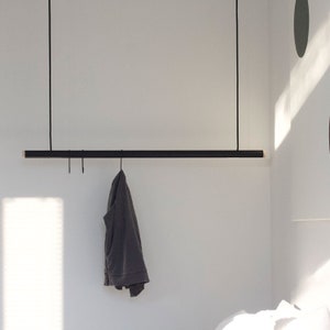 Modern hanging clothes rack