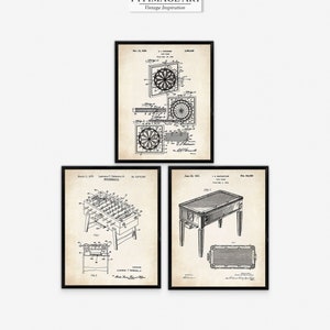 May include: Three vintage black and white patent drawings for a dartboard, table football, and a snooker table. The drawings are in a minimalist style and feature detailed line art.