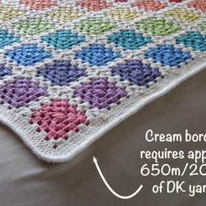 May include: A rainbow crochet baby blanket with a cream border. The text on the image reads "Cream border requires approx 650m/200g of DK yarn".