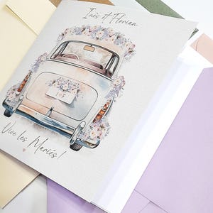 Carte de mariage pliée.
La carte pliée comporte un insert en papier blanc pour que vous puissiez écrire un message. Fourni avec une enveloppe, disponible en plusieurs couleurs