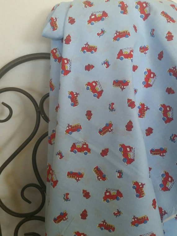 Sweet LIttle Firetrucks, Hydrants, Extinguishers in Bright Red on Light Blue Background 100 Percent Cotton Children's Fabric Free Shipping