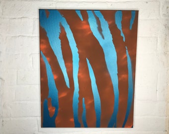 Tiger Stripes painting spray painted orange and metallic blue