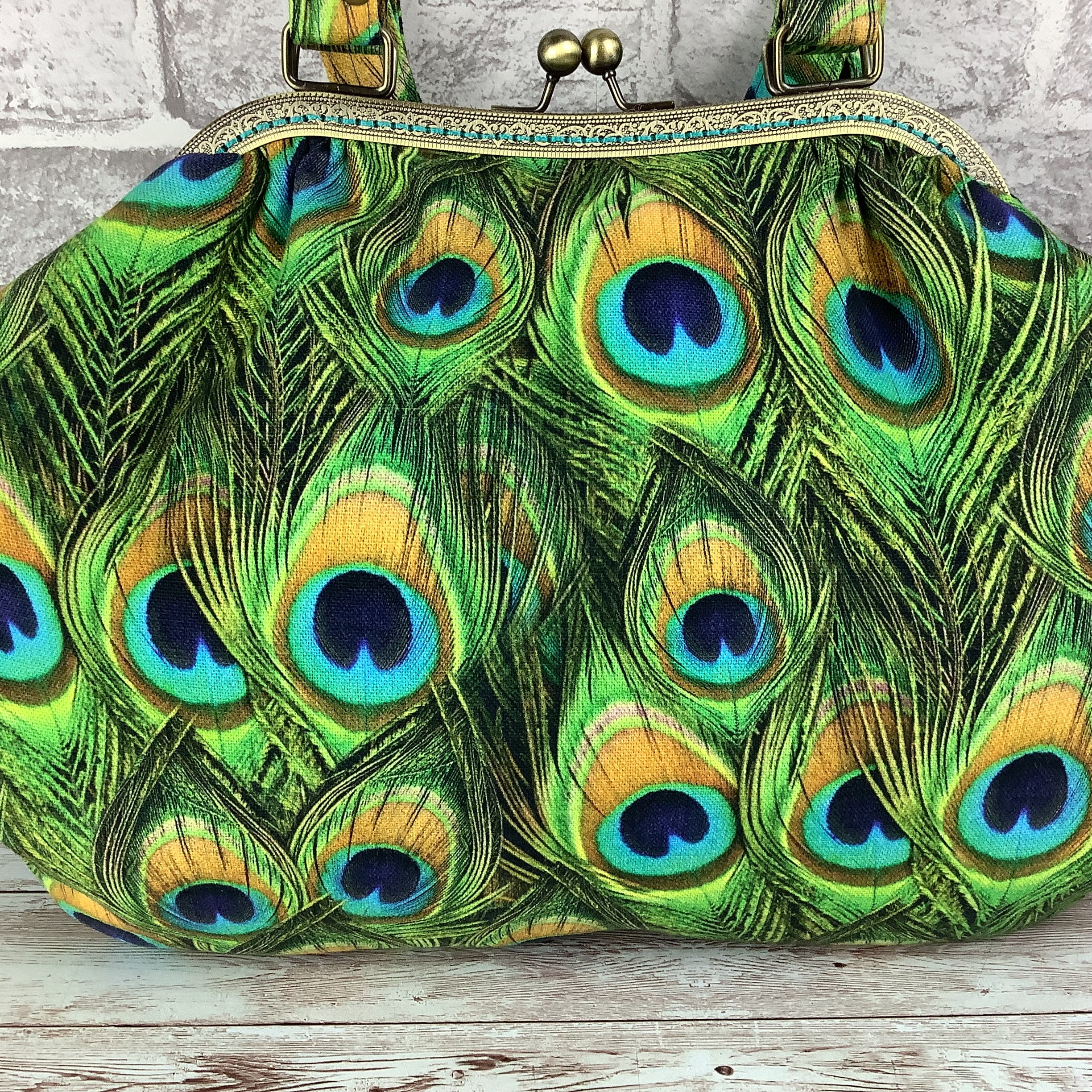 Peacock clutch hotsell