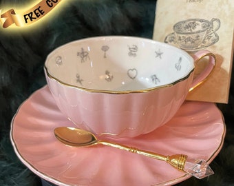 Pale pink pearlescent fortune teller tea cup and saucer set