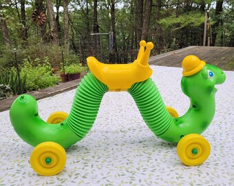 Hasbro Inchworm 1970s Ride On Toy Vintage Original Ride Along Bounce and Go Green and Yellow Inch Worm Clickety Sound Works USA Made