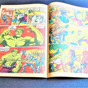 May include: A comic book page featuring the Hulk in a green and purple costume. The Hulk is shown in various poses, including punching, leaping, and roaring. The text on the page reads "I am the Hulk!" and "Hulk!"