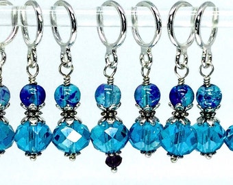 Aqua crystal with purple glass bead stitch markers for knitting and crochet with optional silk bag.