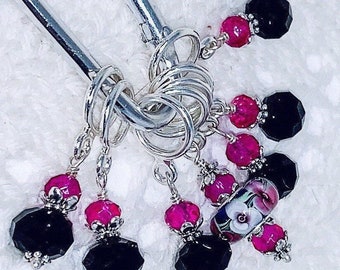 Black & fuschia  crystal stitch markers for knitting and crochet. Floral themed markers.