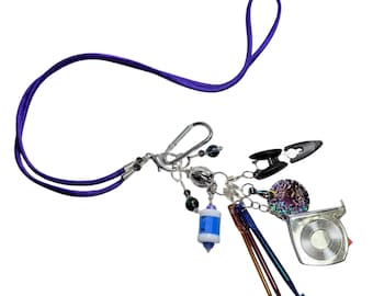 Purple silk lanyard with chatelaine, stitch markers and tools for knittting and crochet