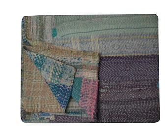 May include: A multi-colored kantha quilt with a patchwork design. The quilt is made of recycled saris and features a variety of colors, including blue, green, pink, and purple.