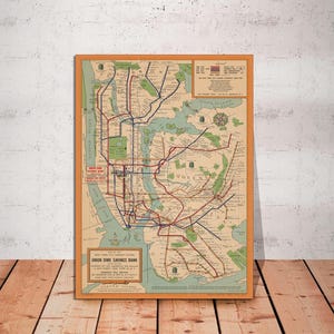 May include: Vintage map of the New York City subway system, printed on a cream-colored background with blue, red, and black lines. The map is titled "New York City Subway System" and features the text "Union Dime Savings Bank" in the bottom left corner.